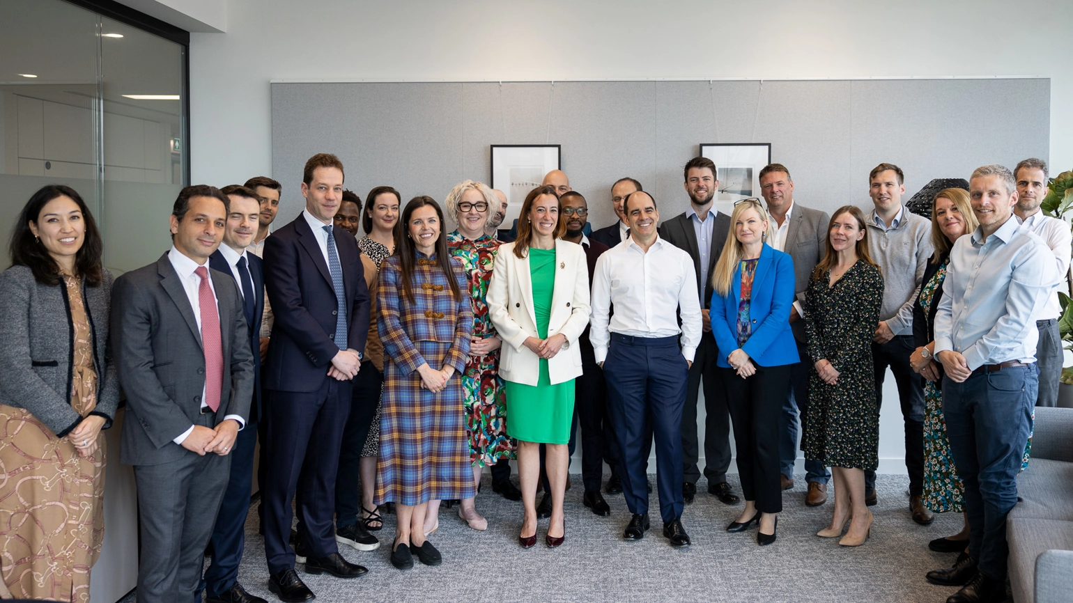 António Simões, Group CEO, L&G, standing in an office, posing for a photo with the team at Blackstone. António Simões, Group CEO, L&G, standing in an office, posing for a photo with the team at Blackstone.